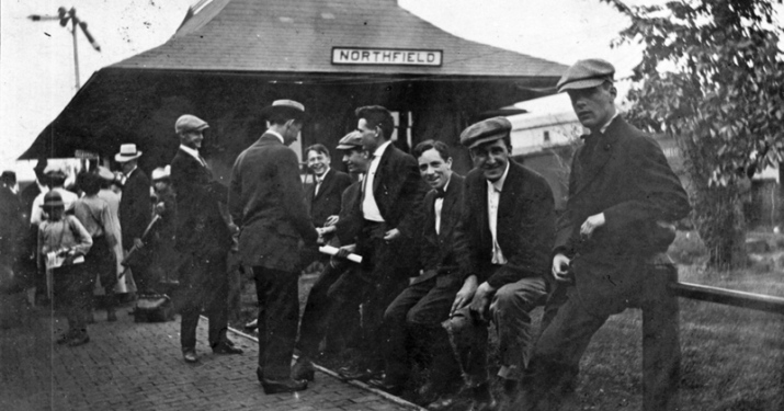 people waiting at the 1888 depot